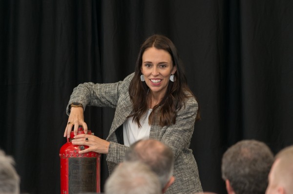 The Prime Minister, Rt Hon Jacinda Ardern, closes the time capsule that is to be